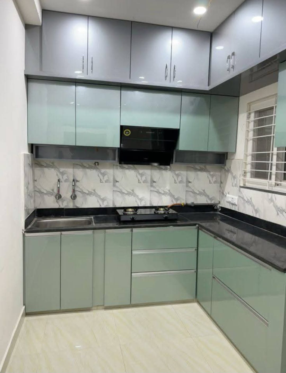 L-shaped modular kitchen by VS Furnitures Indore